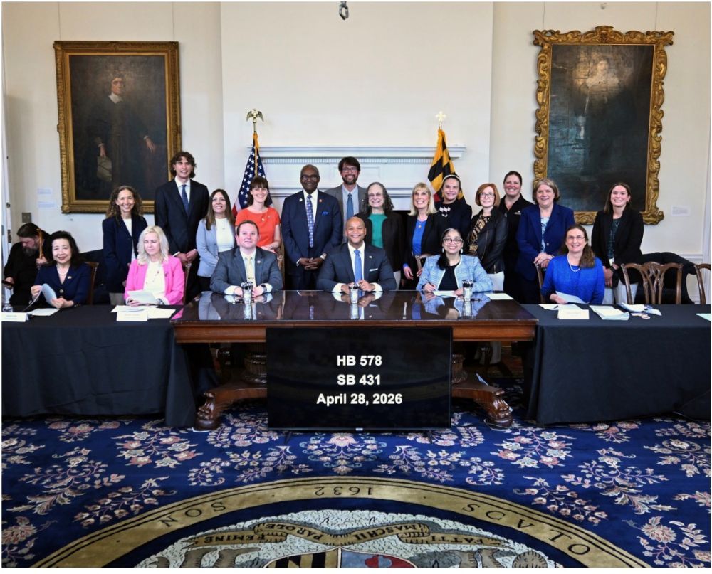 An image of Maryland Governor, Wes Moore, signing HB 578 SB 431.