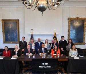 Governor Moore signing HB 564